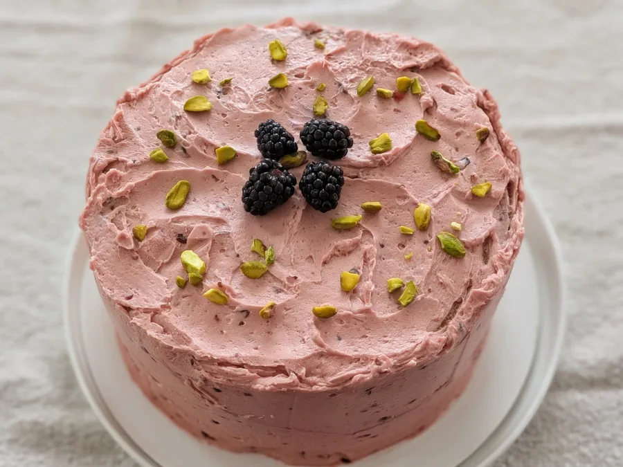 Chocolate birthday cake with berries and a birthday message