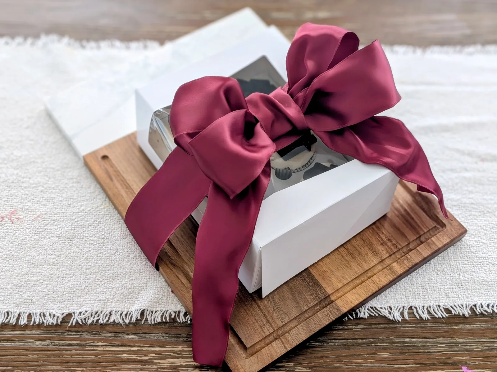 Fresh-baked goods paired with a custom-engraved cutting board
